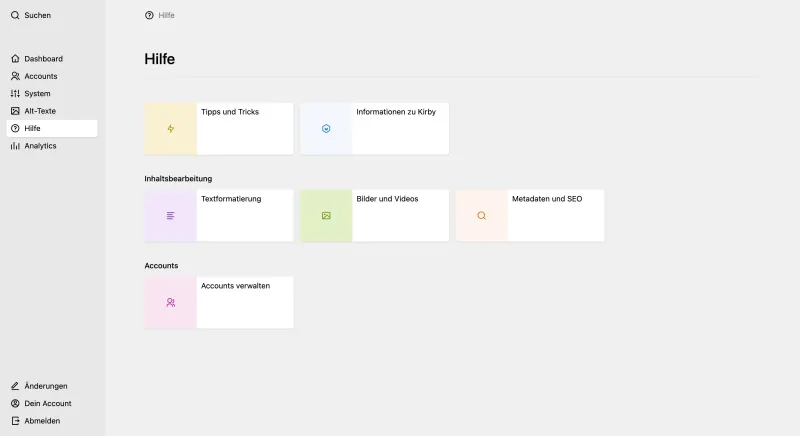 Panel view with "Hilfe"/"Help" headline and multiple cards linking to different help topics like "Tipps und Tricks"/"Tips and Tricks", "Informationen zu Kirby"/"Information about Kirby" and "Textformatierung"/"Text Formatting".